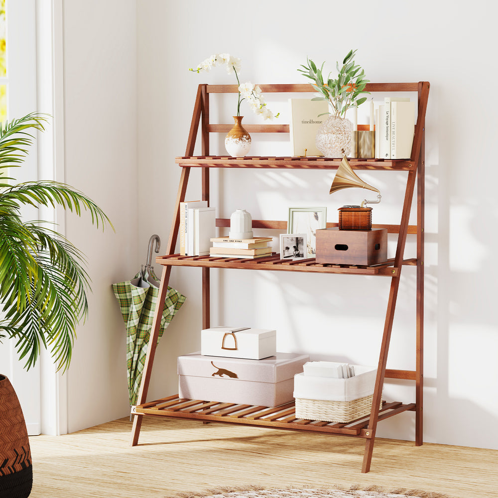3-tier brown bamboo ladder shelf with foldable design, ideal for plants and storage, suitable for indoor and outdoor.