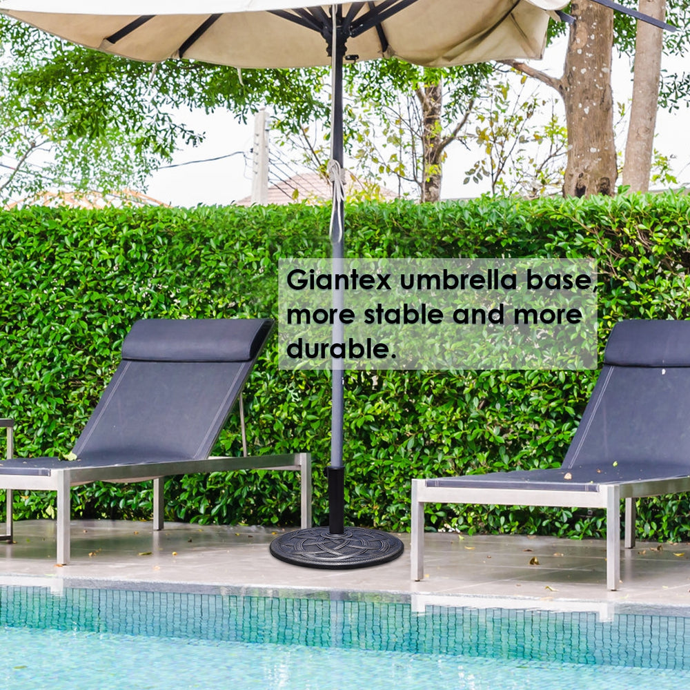 Heavy-duty 22-inch round umbrella base stand with decorative bronze finish for stable outdoor use.