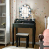 Makeup dressing table in black with touch switch lighted mirror and cushioned stool, ideal for bedroom or bathroom use.