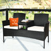 Wicker patio conversation set with removable cushions and table, featuring a durable steel frame for outdoor use.