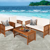 4-piece patio furniture set made of acacia wood with beige cushions, perfect for outdoor relaxation by the beach.