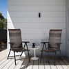 Two folding rattan reclining chairs with a steel frame, perfect for outdoor relaxation on a patio or garden.