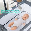 Height adjustable baby side crib in dark gray with thick mattress, toy rack, and music box for convenient nighttime.