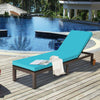 Turquoise outdoor rattan chaise lounge chair showcasing soft cushion and sturdy metal frame, perfect for poolside.