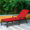 Red cushioned patio rattan lounge chaise recliner with adjustable backrest, ideal for outdoor relaxation.