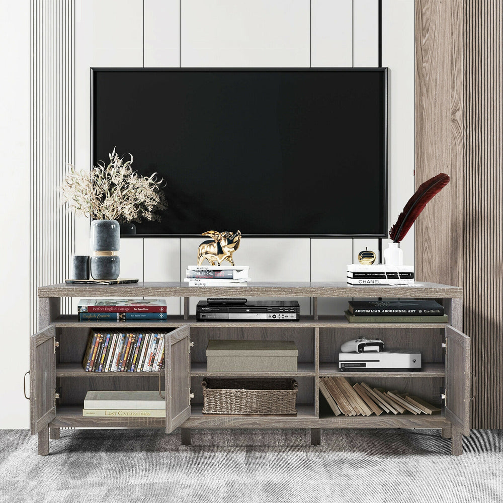 Gray universal TV stand with three cabinets and open shelf, suitable for TVs up to 65 inches, ideal for storage and.