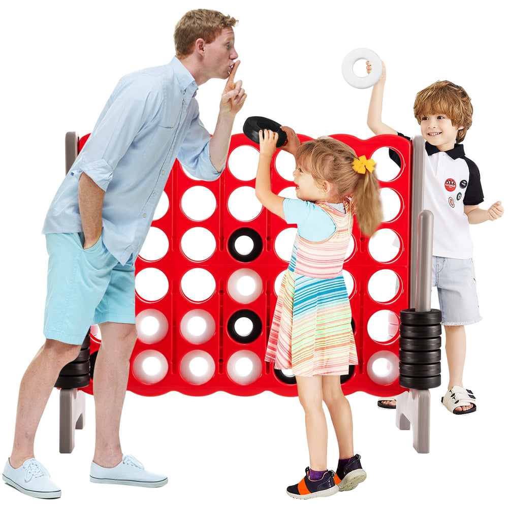 Jumbo 4 to Score game set with kids playing, featuring 42 rings in red, perfect for outdoor parties and skill.