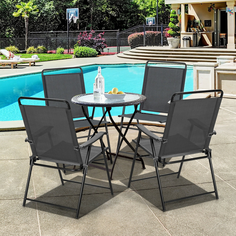 Portable outdoor folding chair set with armrests and a round table, perfect for garden or balcony use.