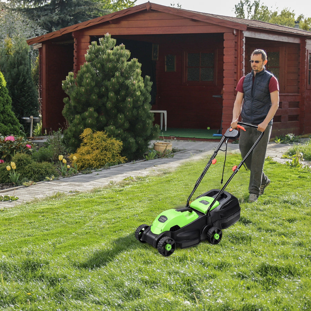 Electric push lawn mower with grass bag, 13-inch cutting width, ergonomic handle, ideal for maintaining your courtyard.