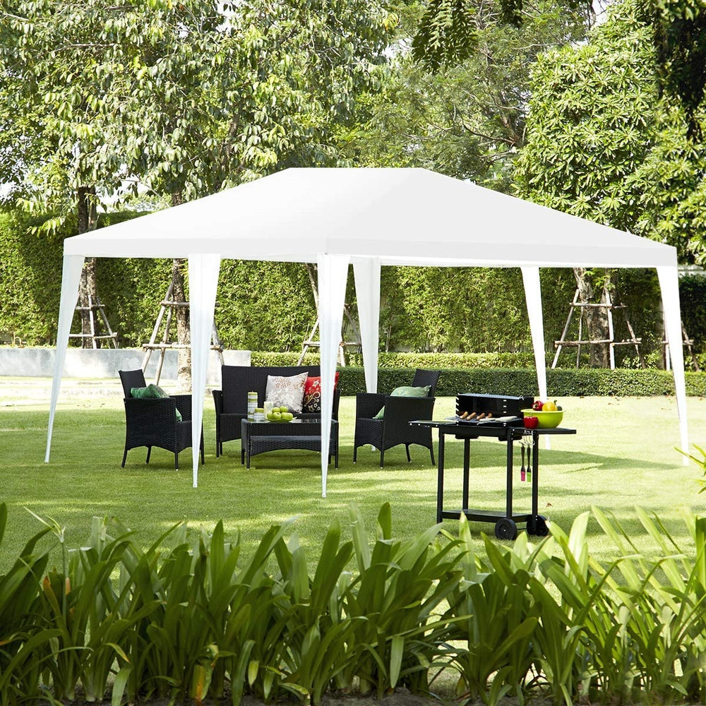 White 10 x 20 feet canopy tent with six sidewalls, ideal for outdoor parties and events, featuring a sturdy steel frame.