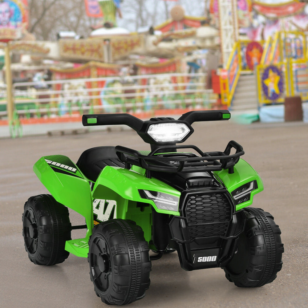 Green 6V kids ATV quad electric ride-on car with LED light, durable wheels, and MP3 function for safe outdoor fun.