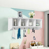 Wall-mounted shelf with four compartments and five hooks for stylish storage in living room or kitchen, made of hard.