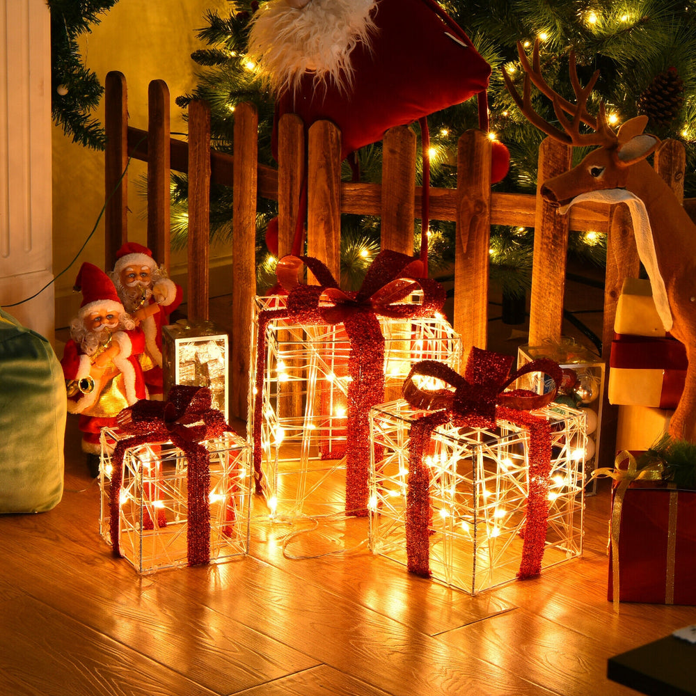Lighted Christmas gift boxes with 60 LED lights, perfect for indoor and outdoor festive decoration.