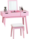 Pink makeup vanity table set with flip-top mirror, 2 drawers, and padded stool for stylish bedroom storage.
