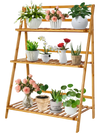 3-tier bamboo foldable plant stand showcasing potted plants, ideal for indoor and outdoor use with a stylish design.