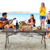 6 feet folding portable rattan table with carrying handle, ideal for outdoor gatherings and easy to store.