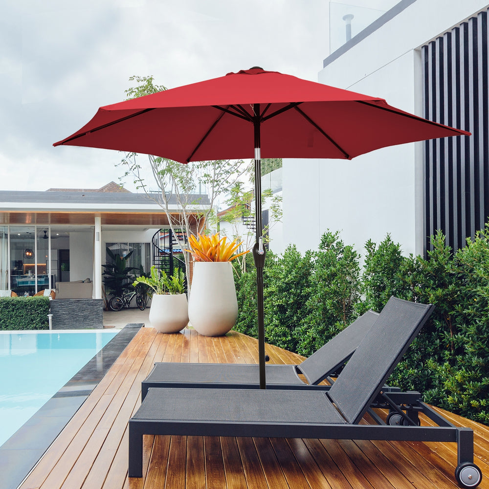 Dark red 10 feet outdoor patio umbrella with tilt adjustment and crank, ideal for poolside relaxation and sun.