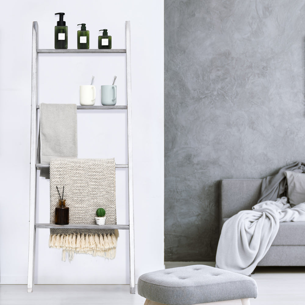 4-tier gray wall leaning ladder shelf made of pine wood, ideal for storing blankets and decor in any room.