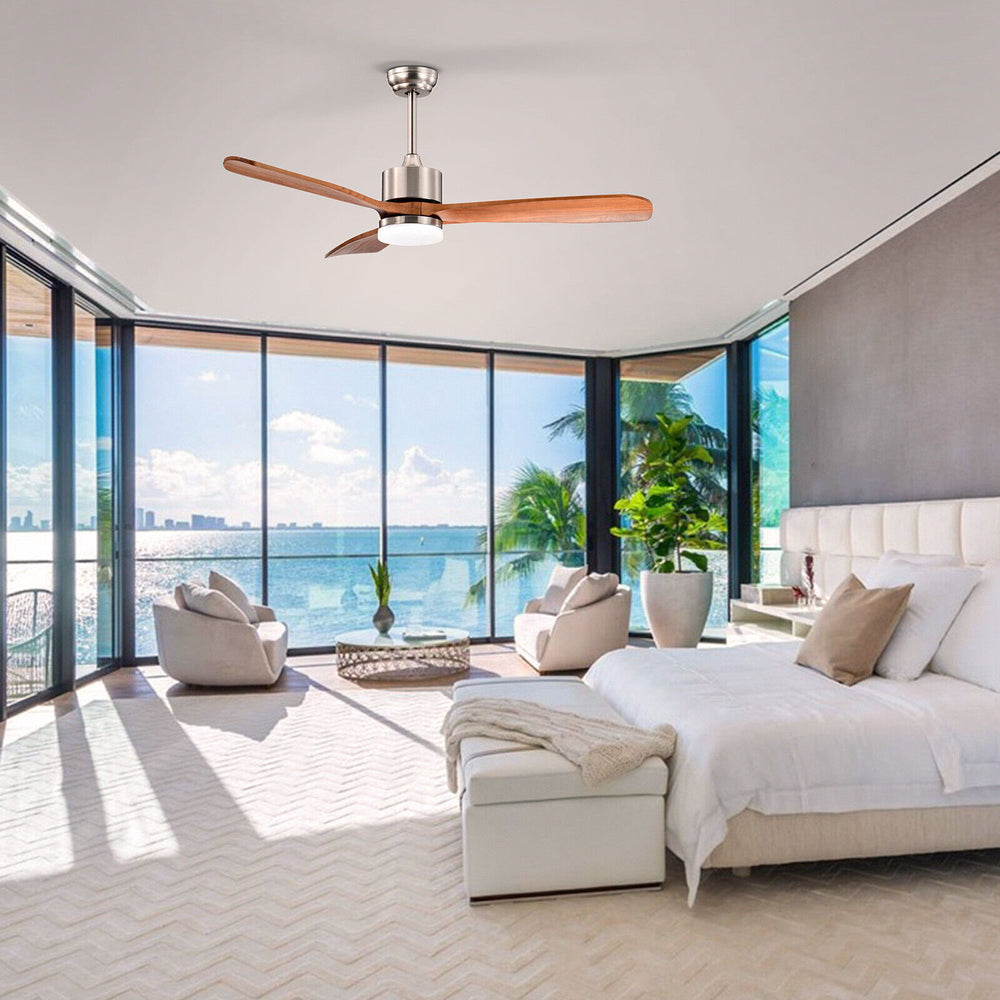 52-inch reversible ceiling fan with LED light, wood blades, and remote control for year-round comfort in a modern.