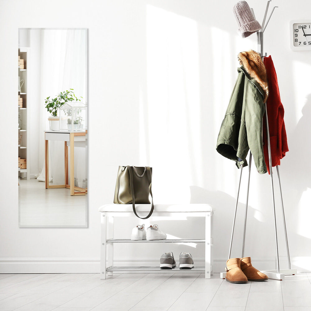 Frameless full-length mirror, 43 x 15 inches, mounted vertically, perfect for bedroom or entryway decor.