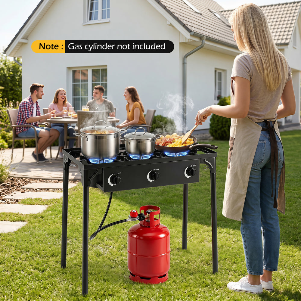 Three-burner propane stove in black with adjustable regulator and hose, perfect for outdoor cooking and family gatherings.