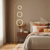 Dimmable 3-circle LED floor lamp in gold with adjustable brightness and color temperatures, perfect for modern bedrooms.