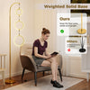 Dimmable 3-circle LED floor lamp in gold with a weighted base, ideal for stylish illumination in living rooms or.