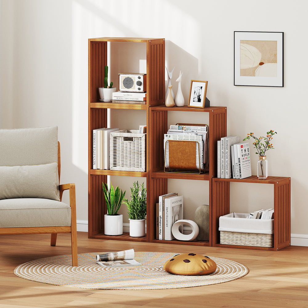 Three cube bookcases made of solid wood with an open slatted design, perfect for storage and display in any room.
