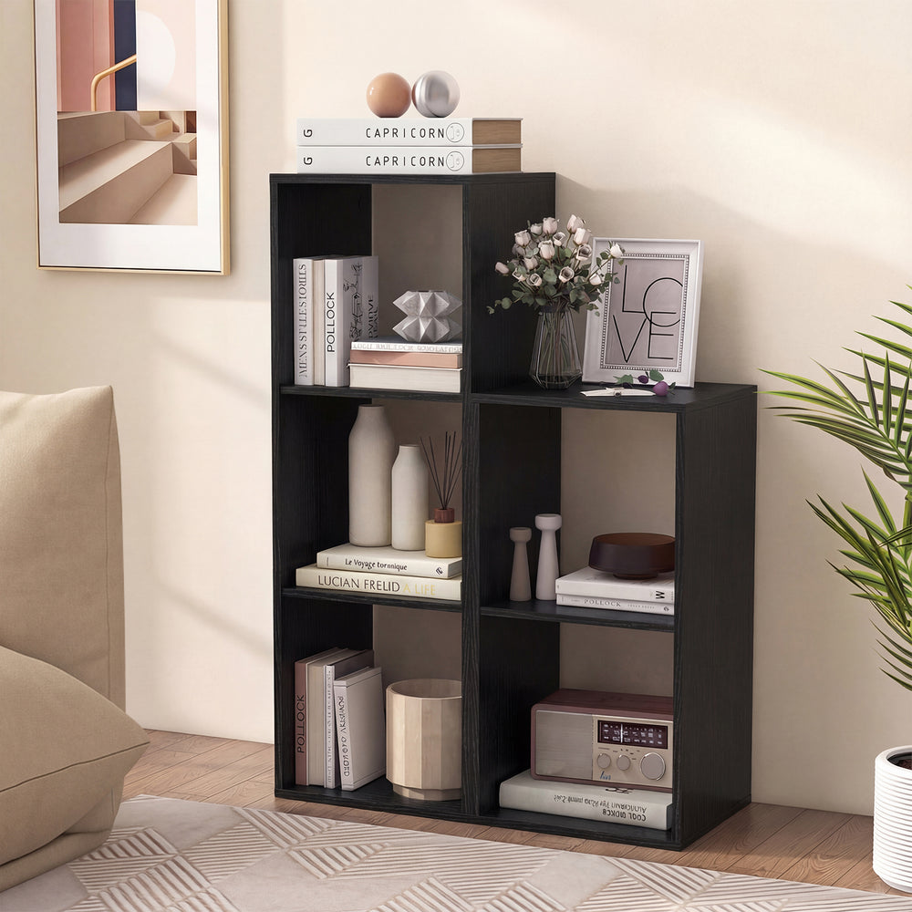 Black 3-cube bookshelf with back guardrail, featuring elegant wood grain, ideal for organizing books and decor in any.
