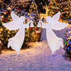 Set of 2 outdoor Christmas angel yard decorations, 3 FT tall, made from waterproof PVC with handheld bells and wings.