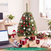 3 FT mini tabletop Christmas tree with 113 green PVC branch tips, decorated for a festive desktop display.