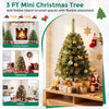 Mini tabletop Christmas tree with 113 green PVC branch tips displayed with holiday ornaments in a cozy room.