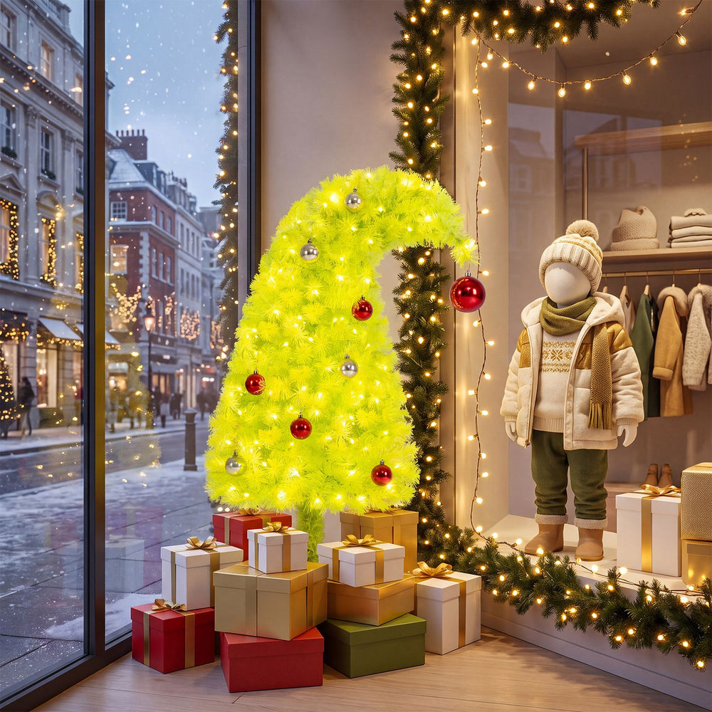 Bright neon chartreuse 3 FT pre-lit Christmas tree with 4 lighted gift boxes creates a festive ambiance for holiday decor.