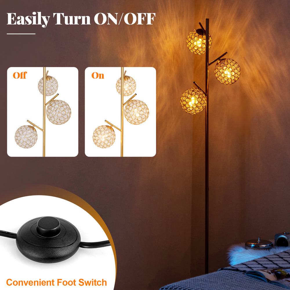 3-globe floor lamp with foot switch, golden finish, featuring acrylic shades for soft light diffusion in homes or cafes.