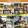 Folding camping table in black with large storage net, ideal for picnics, camping, and RV travel activities.