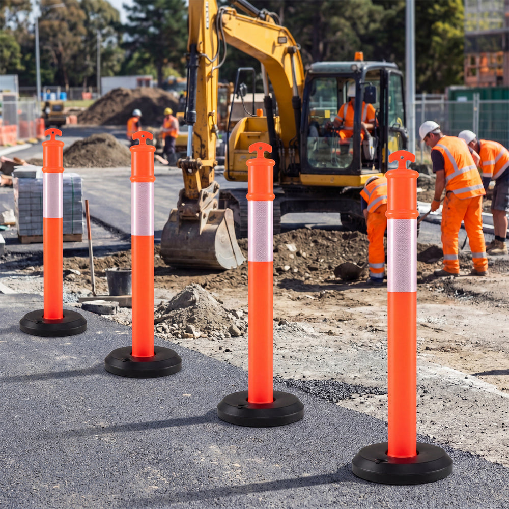 Traffic delineator posts with fillable bases, featuring reflective collars for visibility, ideal for construction and.