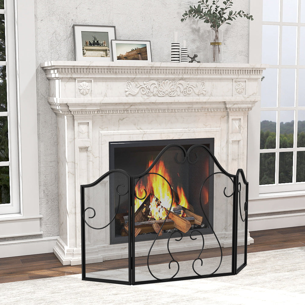 Elegant foldable fireplace screen with decorative scroll design, featuring high-density mesh for enhanced spark.