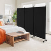 Three-panel black room divider with lockable wheels, providing privacy and easy mobility for any space.