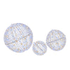 Three lighted metal sphere decorations with 435 LEDs, ideal for hanging or standing in outdoor winter displays.