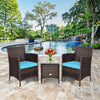 3-piece outdoor rattan wicker furniture set with blue cushions, perfect for patio relaxation by the pool.