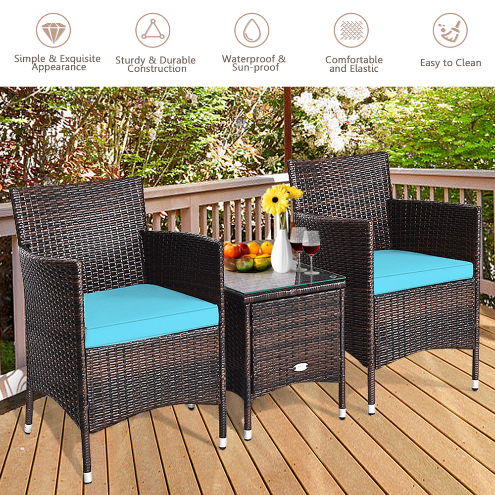Close-up of the blue cushion on a rattan chair from the 3-piece outdoor furniture set, designed for comfortable patio.