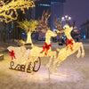 Lighted reindeer and sleigh set with 280 warm white LEDs, red bows, perfect for outdoor Christmas decorations.