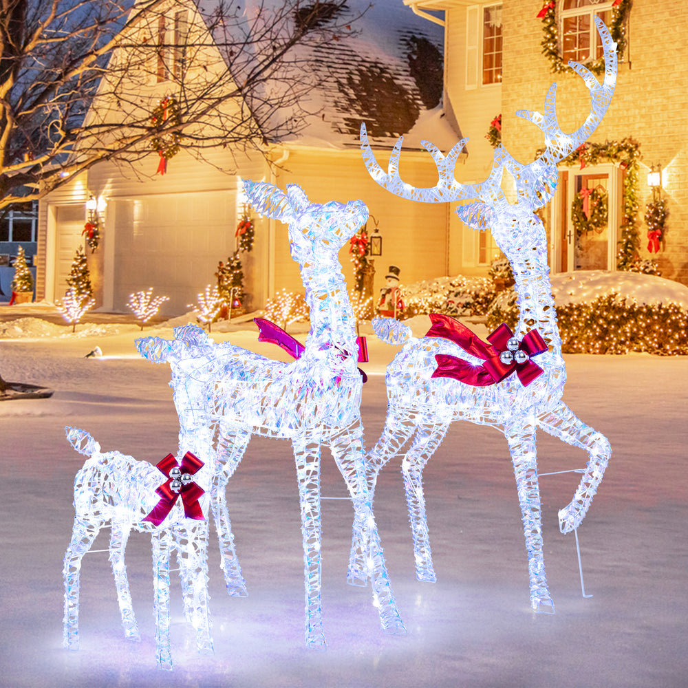 Iridescent 3-piece Christmas reindeer family set with 215 LED lights, perfect for festive outdoor holiday displays.
