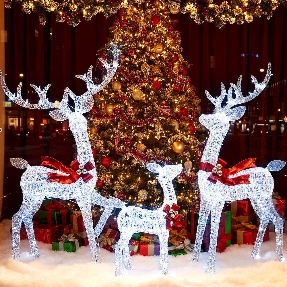 Iridescent 3-piece Christmas reindeer family set with 215 LED lights, perfect for festive indoor or outdoor displays.