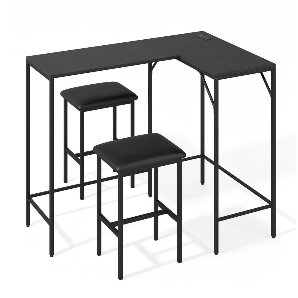 L-shaped kitchen table set in black with two padded stools, featuring AC outlets and USB ports for convenient charging.