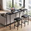 Convertible L-shaped kitchen table set in black with padded chairs, featuring built-in AC outlets and USB ports for convenience.