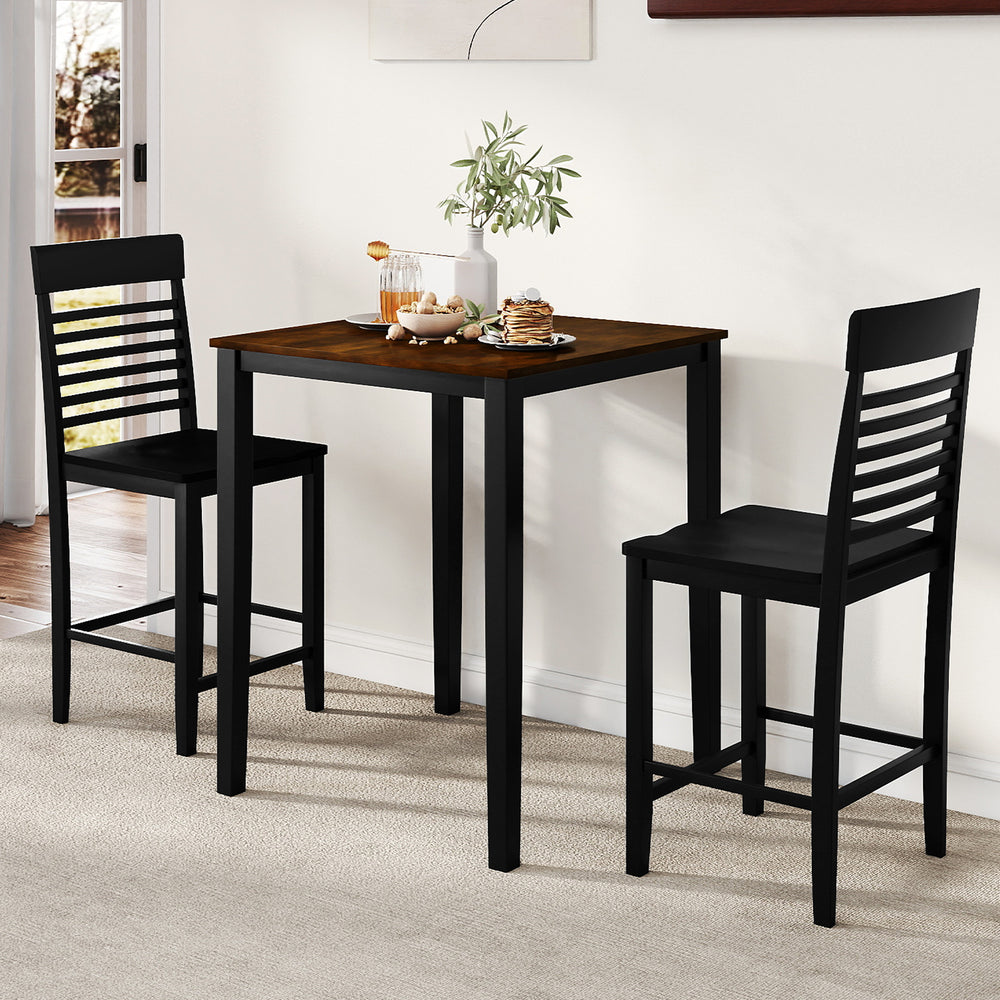 Black counter-height dining chairs with curved backrests and footrests, designed for comfort in small dining areas.