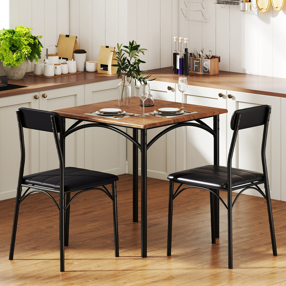 Square dining table set with rustic brown veneered top and two black PU leather chairs, perfect for dining rooms.