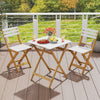 Folding patio bistro set featuring acacia wood chairs and square table, perfect for outdoor dining on the porch.