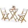 Square tabletop of the folding patio bistro set with acacia wood chairs, perfect for enjoying drinks outdoors.